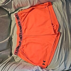 Ladies medium orange under armour shorts.